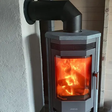 Idyllisches-blockbohlenhaus-mit-eigenem-garten-und-sauna-zum-wohlfuehlen